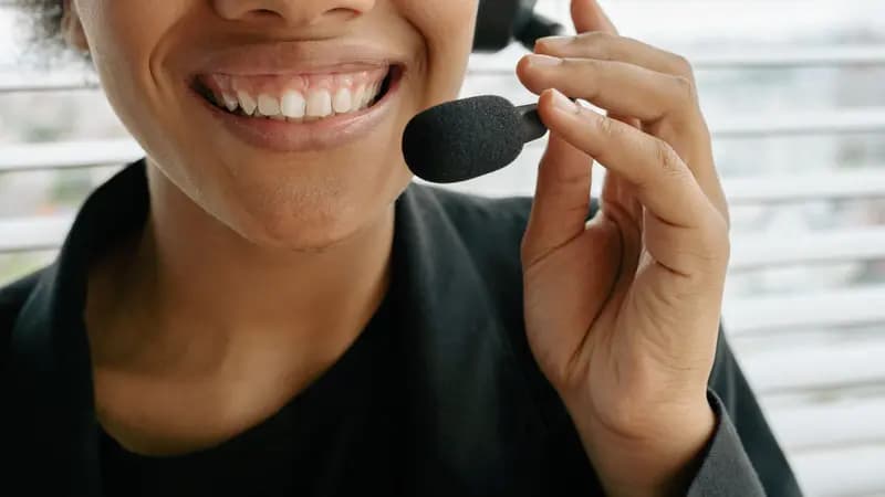 A customer service worker wearing a headset
