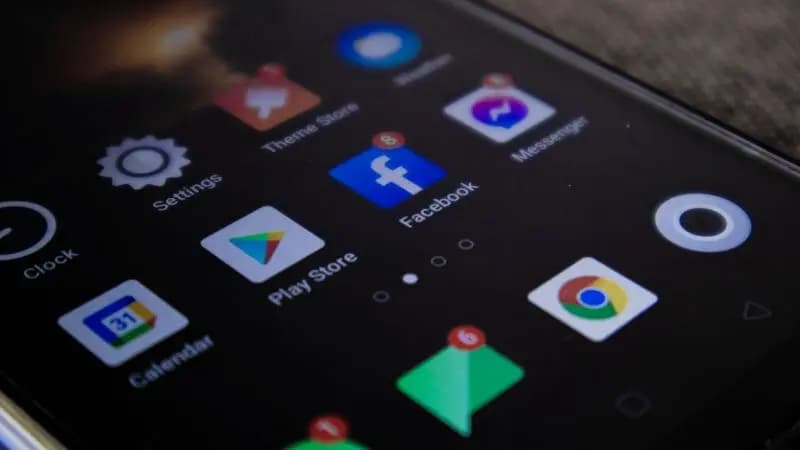 Close-up of mobile app icons displayed on a smartphone screen