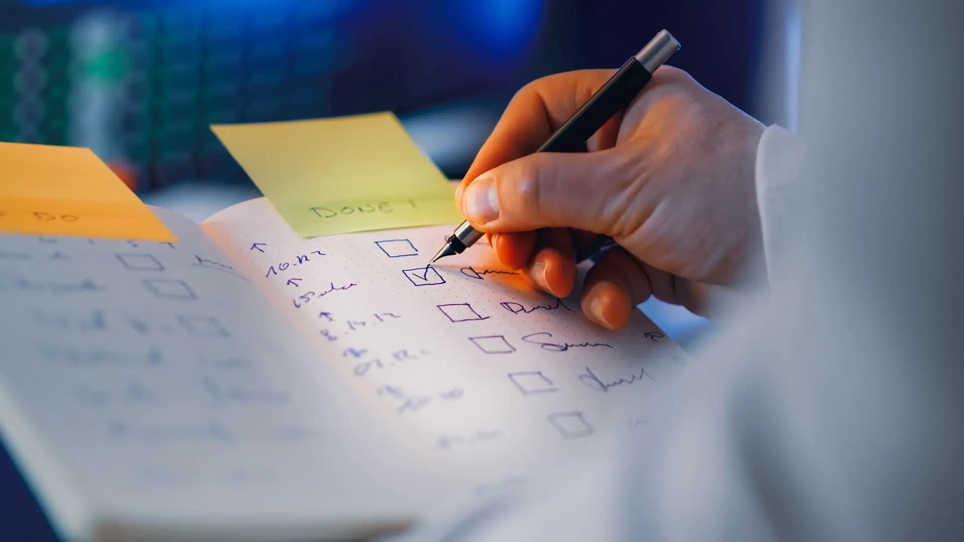 A person checking off items on a checklist