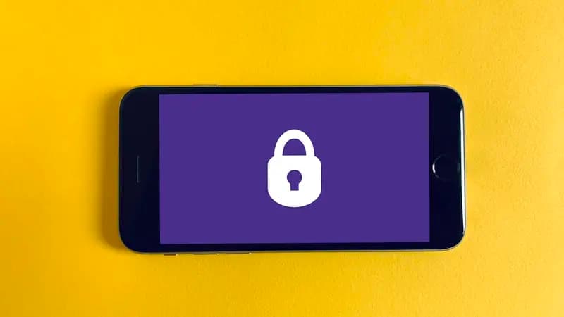 An iPhone showing a padlock on its screen