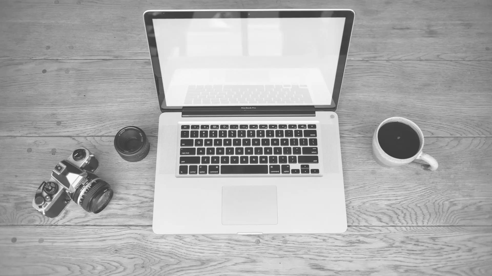 A MacBook laptop on a desk