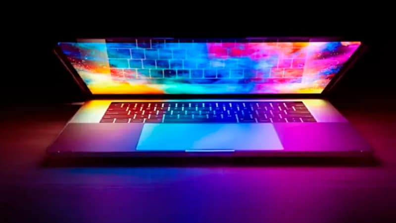 An open laptop with a colourful screen