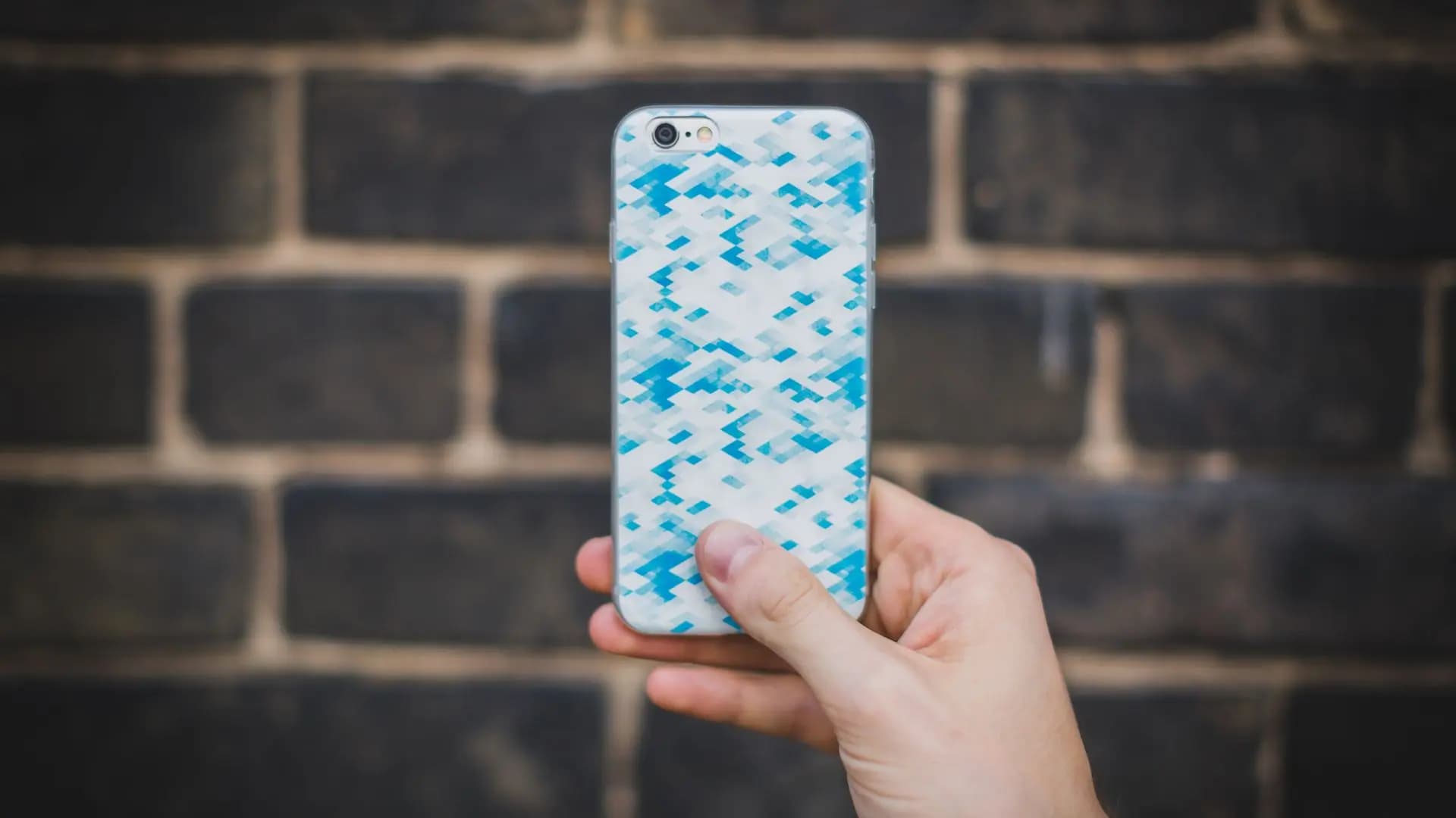 A person holding an iPhone