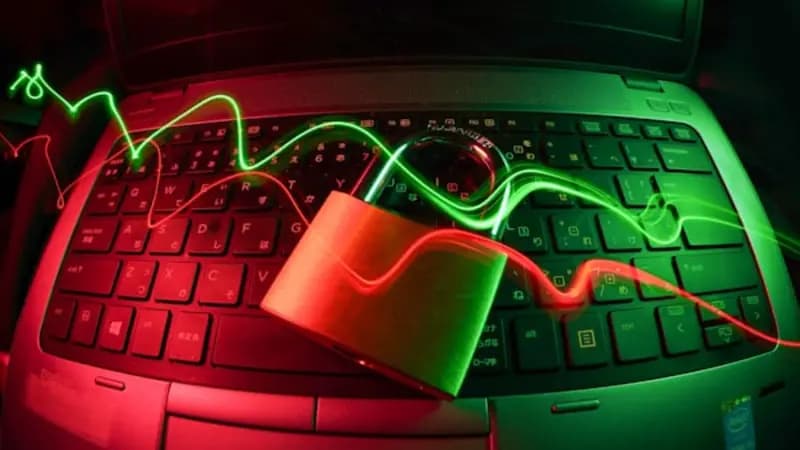 A padlock on a laptop keyboard